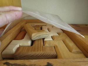 lot 493 image: wooden puzzle in wooden box