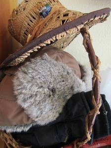 lot 495 image: wicker basket with various hats and gloves