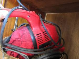 lot 500 image: doubled handles basket with dirt devil hand held vacuum, cleaning brushes and more
