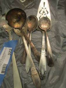lot 322 image: silver plated serving set William rogers and others, cake server, slotted spoon, soup spoon, ladle, serving spoon x 2