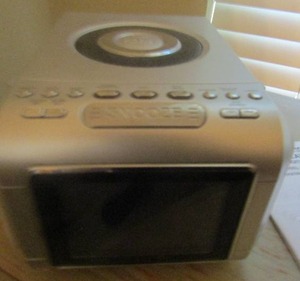 lot 40 image: Dura brand cd player alarm digital clock has paper work