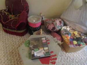 lot 55 image: SEWING SUPPLIES - Thread, pin cushions, needles, safety pins, sewing needles and more