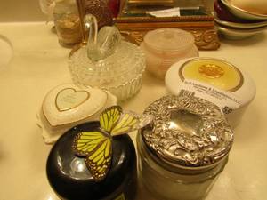 lot 59 image: 4 different face powders, hand therapy cream, lotion