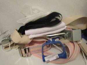 lot 70 image: gate belts, braces and excursive belts and metal arm pullies