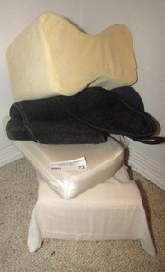 lot 72 image: neck pillows x 4 and 1 back brace