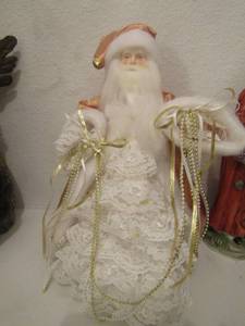 lot 94 image: Santa Claus in a gold robe with matching hat