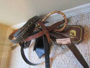 lot 102 image: wooden belt holder and various belts