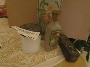 lot 141 image: shade lens, perfume bottle Watkins rose empty, finger nail kit vintage