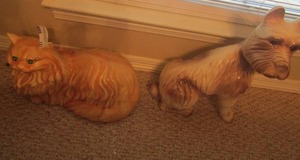 lot 121 image: 16 orange ceramic cat, 17 dog brown n white