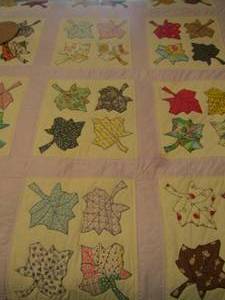 lot 113 image: VINTAGE hand made purple and white quilt  LEAVES