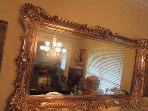 lot 9 image: Gold frame wall mirror 56x 33
