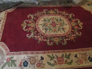 lot 57 image: 8ftx63 burgundy area rug