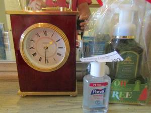 lot 293 image: bath and body works hand soap and sanitizer, table top clock
