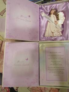 lot 258 image: someone special photo frame with handing angel inside and a fridge magnetic