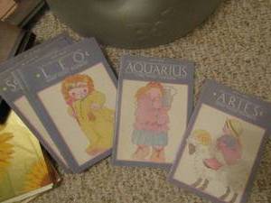 lot 246 image: 2 Lang address books, zodiac sign books, Monet photograph album set and a set of sunflower address books