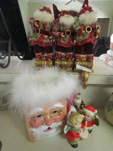 lot 174 image: 3 Santa stocking holders that sit in fireplace, Santa clause vase, and more