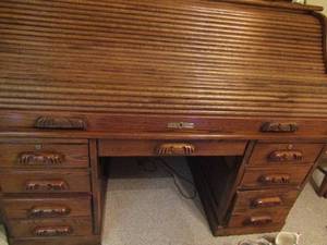lot 5 image: Pure Oak Roll Top desk, 22 DRAWERS,   9 slots for notes or papers, comes with all keys 47 X61 X 33