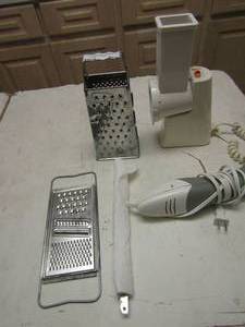 lot 205 image: hand held cheese shredder x 2, black n decker handy slice n shred, electric knife with blades