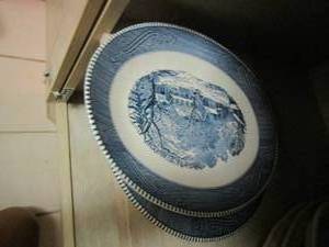 lot 201 image: 2 blue and white oval dinner plates 1 of a house other is horses in a forest