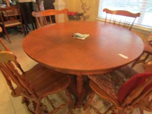 lot 26 image: Oval dining table light brown with 6 wooden chairs