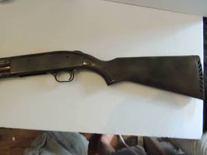 lot 21 image: MOSSBERG DUCKS UNLIMITED 1030 EDITION  CAMO  12 GAUGE PUMP SHOTGUN  2 34 OR 3 SHELLS, 28 MODIFIED BARREL, IN DUCKS UNLIMITED GUN CASE