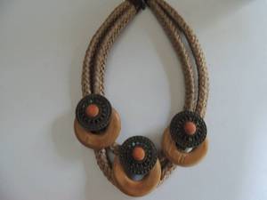 lot 561 image: wood and leather necklace