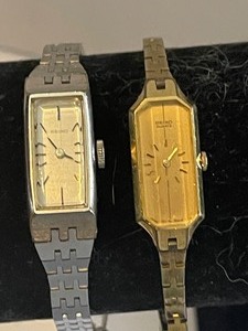 lot 515 image: (10KT)  - 2 Watches - BOTH ARE SEIKO  ONE HAS A 10KT SERVICE AWARD CHARM ATTACHED