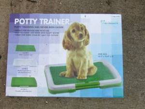 lot 37 image: Potty trainer for puppies, 3 levels includes grass top, great for indoor or patio use New