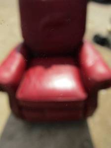 lot 52 image: BarcaLounger reclines, has a few scratches sturdy, red leather