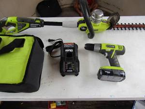 lot 95 image: Ryobi battery operated hedge trimmer , comes with charger, battery and Ryobi drill in case