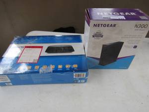 lot 115 image: Links router NIB, Netgear router NIB