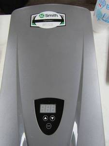 lot 116 image: tankless electric residential water heater in original box unknown working condition