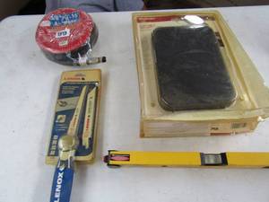 lot 118 image: portable security case new with keys, new Lenox folding jabutility saw new, yellow level, new 38 x 8- 15 air hose