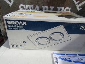 lot 141 image: Braun 2 bulb heater NIB