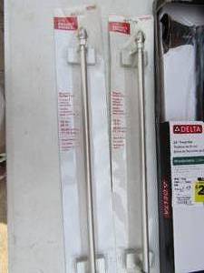 lot 150 image: Various types of NIB towel bars qty 4
