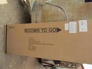 lot 154 image: Rooms to go Gina bed size queen NIB, color Brown is what shows, bed unseen in box