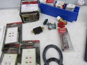 lot 186 image: Misc. tool bucket includes, hot and cold water shut off valves, shackle links, wall plates, turn Lok receptacle plugs qty 5