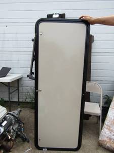 lot 187 image: 6022 cabinet door or storage door New for a travel trailer