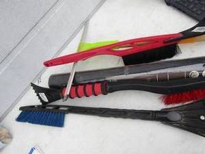 lot 193 image: lot of window squeegees all sizes, new roll of flower bed weed barrier