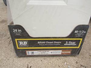 lot 198 image: Bifold closet doors has water damage but still in original packaging, 8012