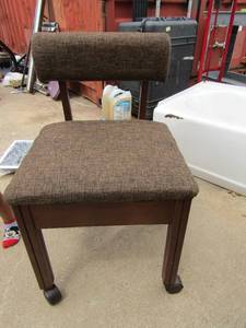 lot 209 image: Singer rolling chair with under seat storage, very nice chair in mint condition