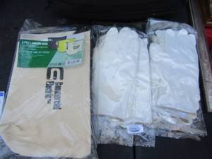 lot 215 image: white bucket of new gloves and tool bags