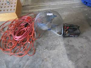 lot 241 image: solar 612 volt battery charger, high velocity Patton workshop fan, blue 2 step step ladder, orange light and extension cord