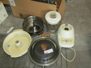 lot 247 image: kitchen lot includes, bunt pan, Hamilton beach blender,2 stainless steal pans, and a oven rack