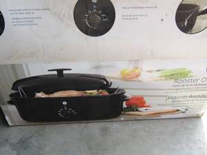 lot 279 image: GE roaster oven NIB, holds 18 lb. turkey