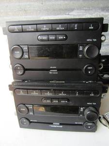 lot 299 image: 2007 ford pick up truck Radio with 9 disk cd players, unknown working condition qty 2