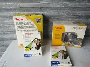 lot 325 image: Kodak camera, Kodak expansion pack both new, 2 packs of Epson premium gloss photo paper