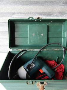 lot 327 image: Green tool box with a Black and decker power drill
