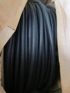 lot 382 image: Roll of black hose tubing