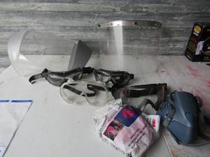 lot 381 image: clear tub full of new painting mask, safety goggles, face shields all new